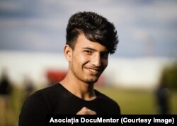 Portret de migrant