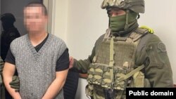 The 22-year-old Kazakh man is suspected of joining an armed group in Syria.