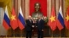 Președintele rus, Vladimir Putin și omologul său vietnamez, To Lam.