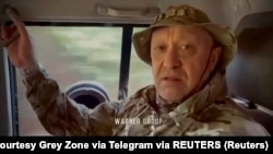 Jevgenij Prigožin, šef ruske privatne skupine plaćenika Wagner, unutar vozila na nepoznatoj lokaciji, na ovoj fotografiji preuzetoj iz videa koji je vjerojatno snimljen u Africi i objavljen 31. kolovoza 2023. 
