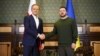 Președintele Ucrainei, Volodimir Zelenski, și prim-ministrul Poloniei, Donald Tusk. Kiev, 22 ianuarie 2024.