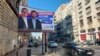 Bilbord vladajuće Srpske napredne stranke pred izbore 17. decembra. Pored predsednika Srbije Vučića, čije ime nosi lista SNS-a, na bilbordu je kandidat za gradonačelnika Beograda Aleksandar Šapić. 