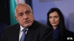 Лидерът на ГЕРБ Бойко Борисов и номинираната за премиер от партията му Мария Габриел на пресконференцията в парламента в сряда, 20 март 2024 г.