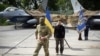 Президент України Володимир Зеленський на тлі винищувачів F-16 у День Повітряних сил ЗСУ. Київська область, 4 серпня 2024 року 