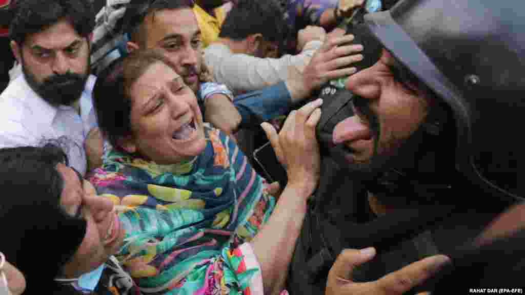 At least 69 people have been injured in the violence in Lahore, including 34 police officers, a Pakistani police official said on the condition of anonymity.