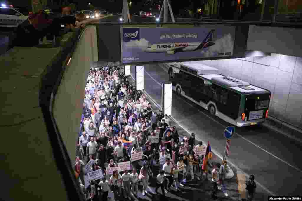 The July 25 protest marches through a motorway tunnel in Yerevan. The ICRC say the last time they were able to bring medicines and essential food items through Azerbaijan's blockade, "was several weeks ago." 