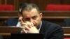 Armenia - Economy Minister Vahan Kerobian attends a session of the Armenian parliament.
