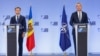 Prim-ministrul R. Moldova, Dorin Recean (stânga) și secretarul general NATO, Jens Stoltenberg, fac declarații pentru presă la Bruxelles, octombrie 2023.