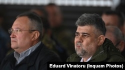 Prim-ministrul Marcel Ciolacu și liderul PNL, Nicolae Ciucă.