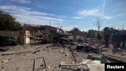 Uništena zgrada nakon američkog zračnog napada u D'al Kaim, Irak, 3. februara 2024.
