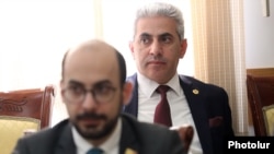 Armenia - Pro-government deputy Artur Hovannisian (left) attends a paliament committee meeting, April 4, 2023.