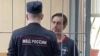 Michael Leake appears in court in Moscow in a photo issued on July 18.