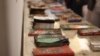 Обгорілі книжки з Харкова, виставлені на «Книжковому Арсеналі»в Києві. Травень 2024 року