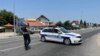 Police close the road to Lipnicki Sor in Loznica on July 18.