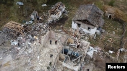 Наслідки російського удару по селу Гроза на Харківщині, внаслідок якого в жовтні загинули 59 людей