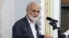 Iran -- Hassan Amini, religious figure and religious judges in Iranian region of Kurdistan. 