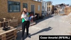 Doina Iliescu photographed outside her temporary accommodations in Crevedia. 