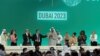 După o noapte albă, delegații de la COP28 au căzut de acord asupra unei rezoluții istorice, care ar putea începe eliminarea treptată a combustibililor fosili. Dubai, 13 decembrie.