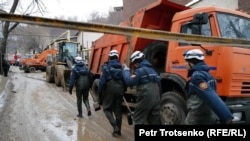 Rescue workers attend the scene of a deadly landside in Almaty, Kazakhstan, on February 8.