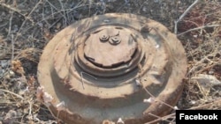 Ական