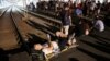 People block the Centre Railway Station in Belgrade during a protest against Rio Tinto's lithium mining project. 