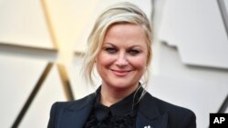 Ейми Поулър пристига на церемонията по връчването на Оскарите, 24 февруари 2019 г., Лос Анджелис. 