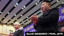 Володимир Путін (ліворуч) і лідер Північної Кореї Кім Чен Ин. Пхеньян, 19 червня 2024 року