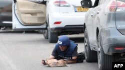 Израилдин Сдерот шаарындагы журналист. 
