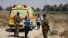 Izraelski vojnici i medicinski radnici na prijelazu Kerem Shalom, u blizini izraelske granice s Gazom u južnom Izraelu, 5. maj 2024.