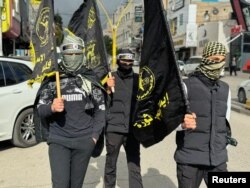 Palestinci na protestima nakon ubistva jednog od lidera Hamasa, Saleha Arourija u Hebronu, Zapadna obala, 3. januar 2024.