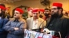 اېمل ولي خان په سوات کې د ګوند یوې غونډې ته وینا کوي - پخوانی انځور. 