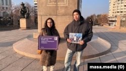 Kazakh activists picket in support of jailed colleagues in Almaty on January 3.