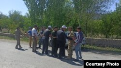 Эки тараптуу жолугушуудан тартылган сүрөт. 