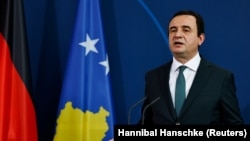 Kosovski premijer Aljbin Kurti govori tokom konferencije za novinare sa nemačkim kancelarom Olafom Šolcom u Berlinu, Nemačka, 4. maja 2022.