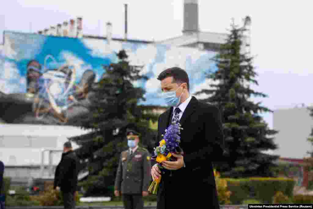 Ukrainian President Volodymyr Zelenskiy visits the exclusion zone to attend a ceremony marking the 35th anniversary of the Chernobyl accident. "Our task is to do everything possible to bolster security and strengthen safety to avoid and never repeat a similar disaster in the future," Zelenskiy said in a televised address on April 26.
