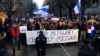 Руснаци - противници на Владимир Путин и режима му, на шествие в сръбската столица Белград против руската военна инвазия в Украйна, декември 2022 г. 