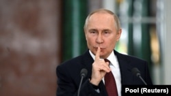 Путин