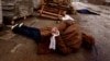 Cadavrul unui civil cu mâinile legate la spate a fost fotografiat în Bucea, pe 3 aprilie 2022, după retragerea forțelor rusești. Localnicii spun că persoana respectivă a fost împușcată de soldații ruși.