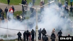 Belarusian police detain protesters at a rally against police violence and the presidential election results in Minsk last month.