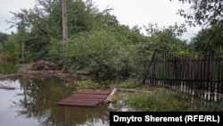 Затопило будинки та городи. Наслідки ракетних атак Росії по Кривому Рогу (фотогалерея)