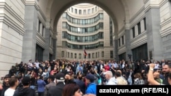 Opposition protesters block the entrances of the building of the Foreign Ministry in Yerevan on May 24.