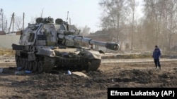 Російський танк на українській землі 