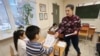 PERM, RUSSIA – DECEMBER 23, 2017: Boys and girls attend classes for children of migrants. Maxim Kimerling/TASS
