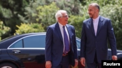 The European Union's foreign policy chief Josep Borrell (left) meets Iranian Foreign Minister Amir-Abdollahian in Tehran in June 2022.