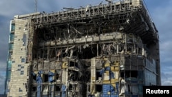 A view shows the Kharkiv Palace Hotel heavily damaged by a Russian missile strike on December 31.