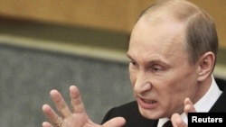 Russian Prime Minister Vladimir Putin makes his last address to the State Duma before parliamentary elections in December.
