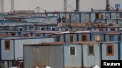 Rossiya ishchi migrantlarining yashash vagonchalari 