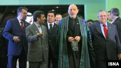 Iranian President Mahmud Ahmadinejad (second from left), with Tajik President Emomali Rahmon (left), Afghan President Hamid Karzai (second from right), and Iraq President Jalal Talabani (right)