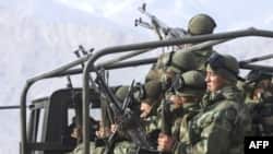 Turkish soldiers return from a mission near the Iraqi border
