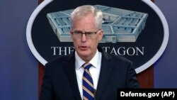 U.S. Acting Defense Secretary Christopher Miller speaks at the Pentagon in Washington on November 17.
